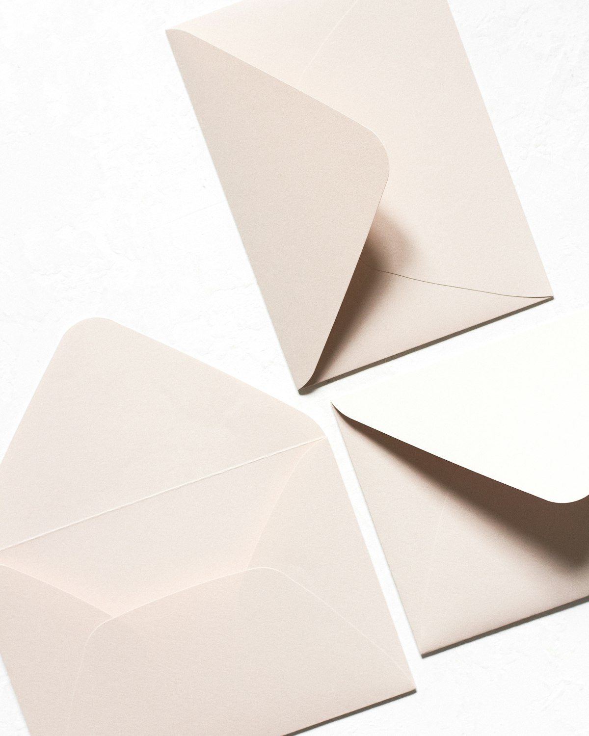 Cream gift card printed with the Jane Doe wordmark, resting in an envelope