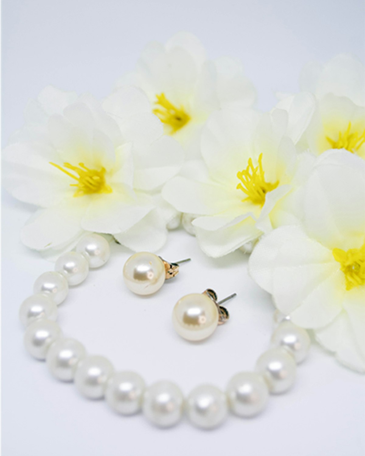 Pair of freshwater pearl drop earrings with slim gold posts