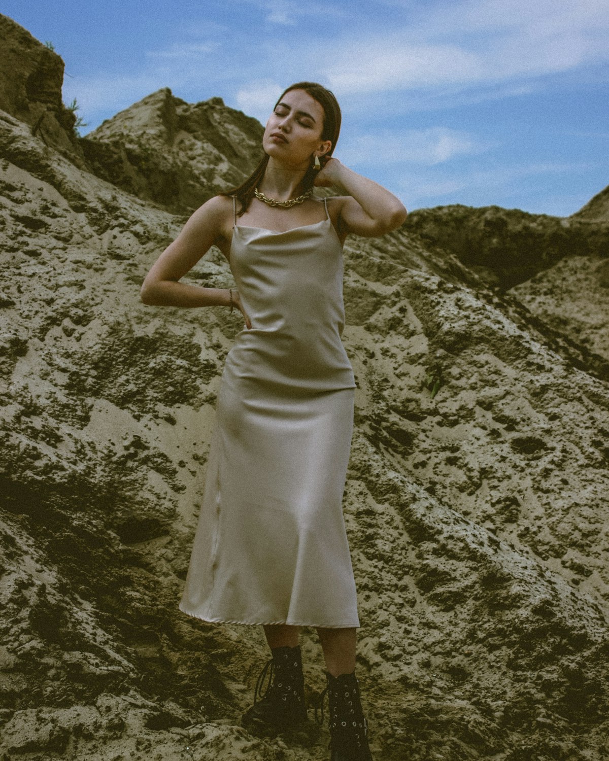 Champagne silk slip dress with thin straps and a bias cut skirt